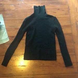 Green turtleneck sweater
